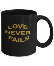 Love Never Fails Coffee Mug